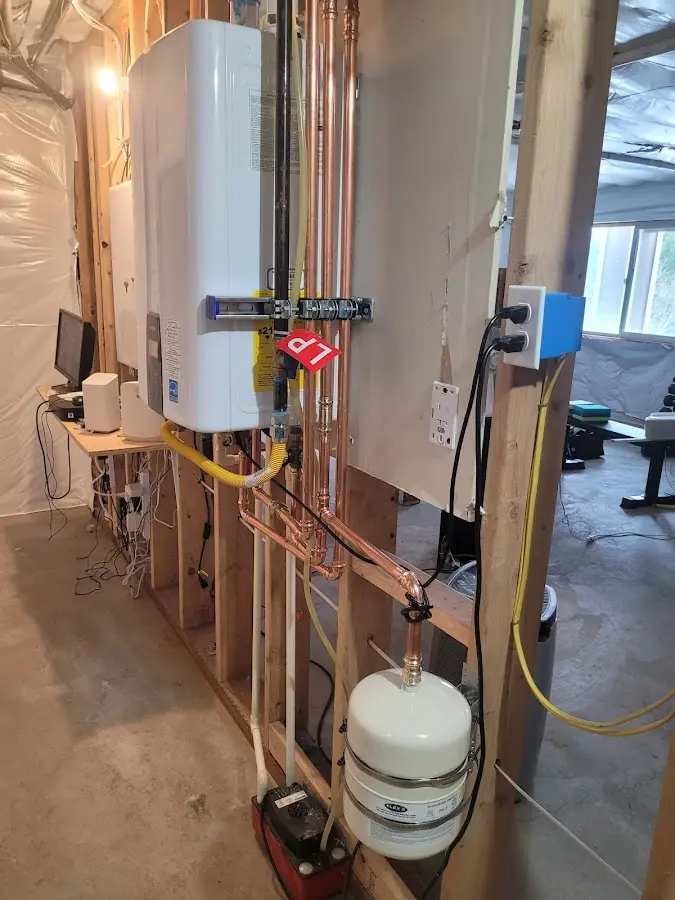 Licensed plumber repairing a kitchen sink in Big Coppitt Key